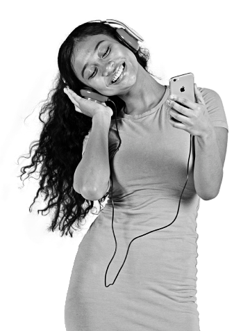 A woman smiling wearing headphones